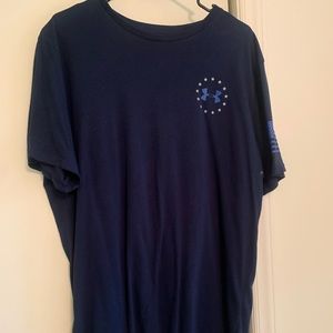 Under Armour “Freedom” Navy short sleeve t-shirt.  Excellent condition.  XL.